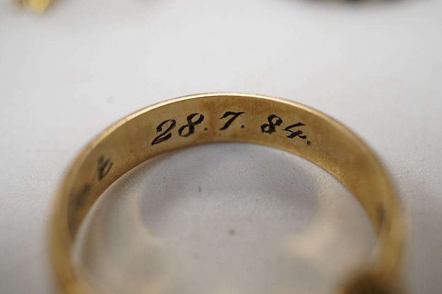 A collection of jewels, including a shell cameo pendant, length 3cm; a chain, length 45.5cm; two sapphire and diamond rings, each size H; and a wedding band, size J, each with British hallmarks for 9ct gold, combined gro